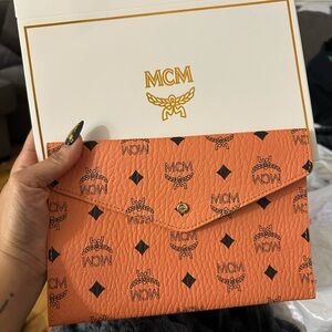 MCM Vibrant Orange Monogram Clutch